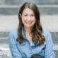 Woman on steps smiling